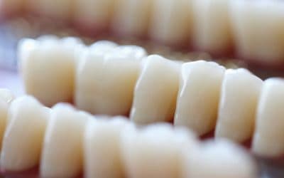 Dental Crowns and Bridges: Restoring Strength and Symmetry to Your Smile
